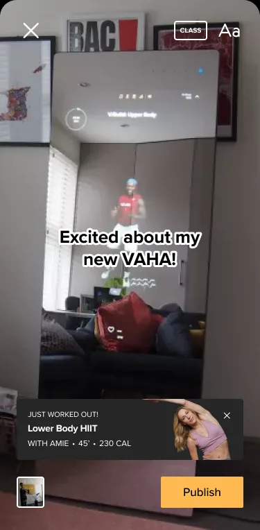 Posting a story from a class: a photo of the mirror during a class, the text Excited about my new VAHA, a Just worked out card for Lower Body HIIT, a class tag and a Publish button.